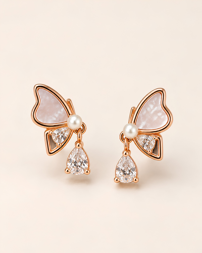 Pearl Drop Butterfly Stud Earrings worn on model