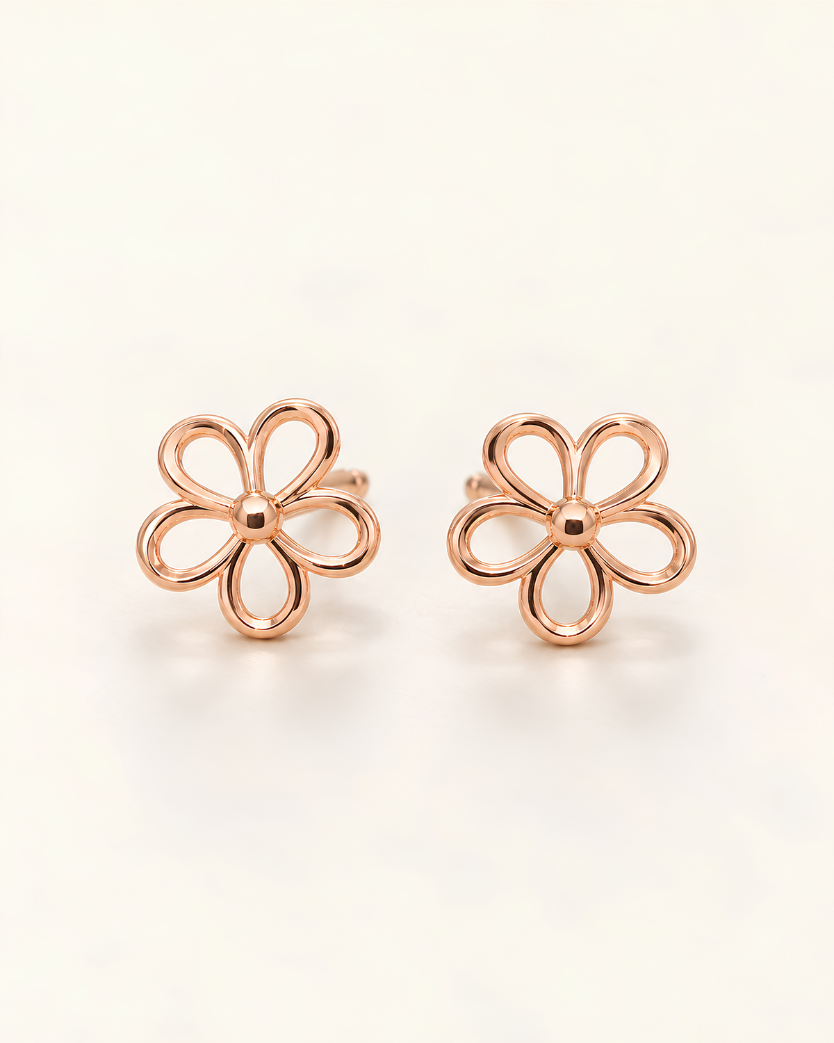 Close-up of Open Flower Stud Earrings showing the wireframe petal detailing