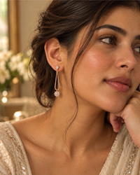 Floral Drop Chain Earrings worn on model, alternate view